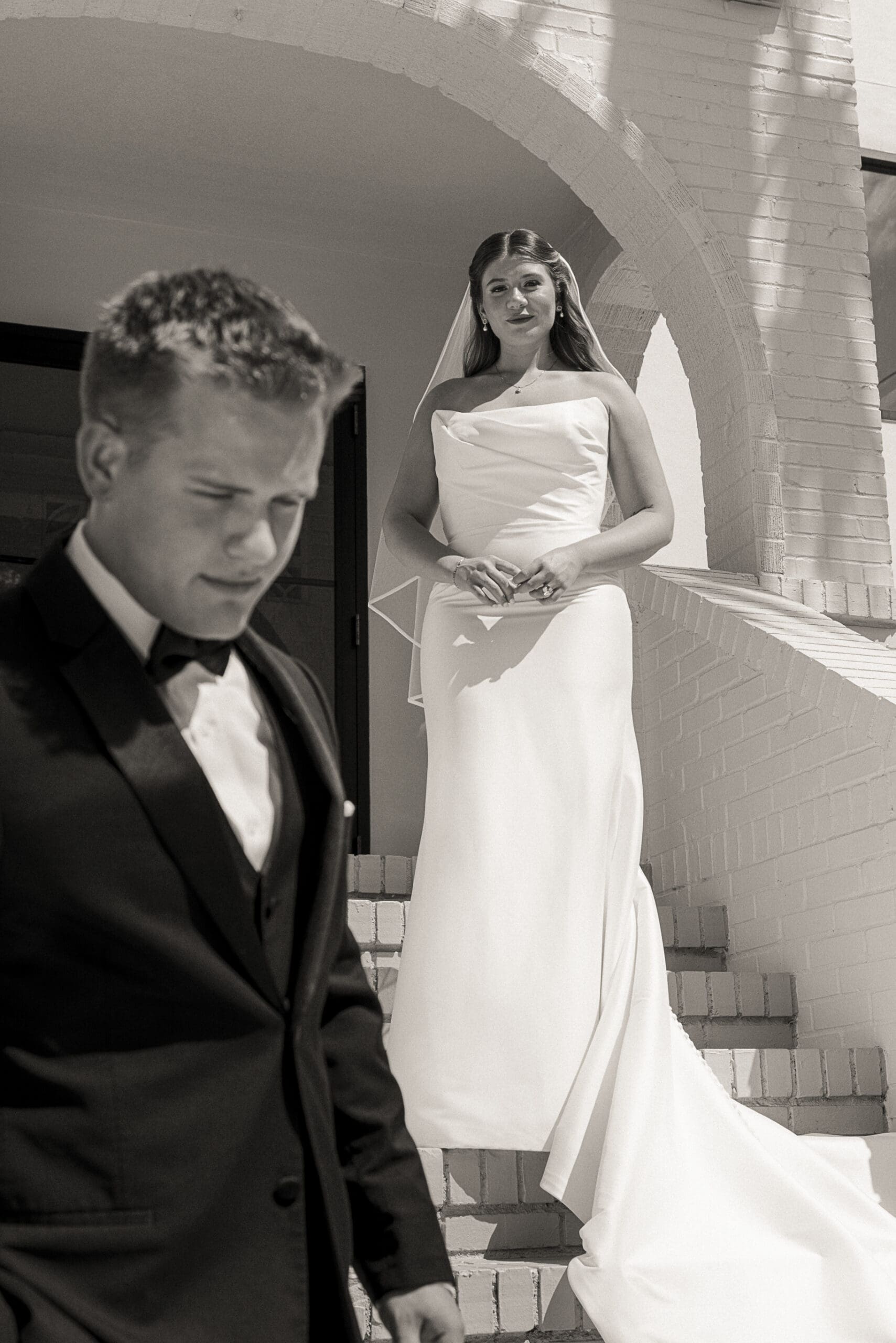 Fine art wedding portrait capturing the quiet emotion between bride and groom, styled and composed in an editorial Jacksonville setting. 