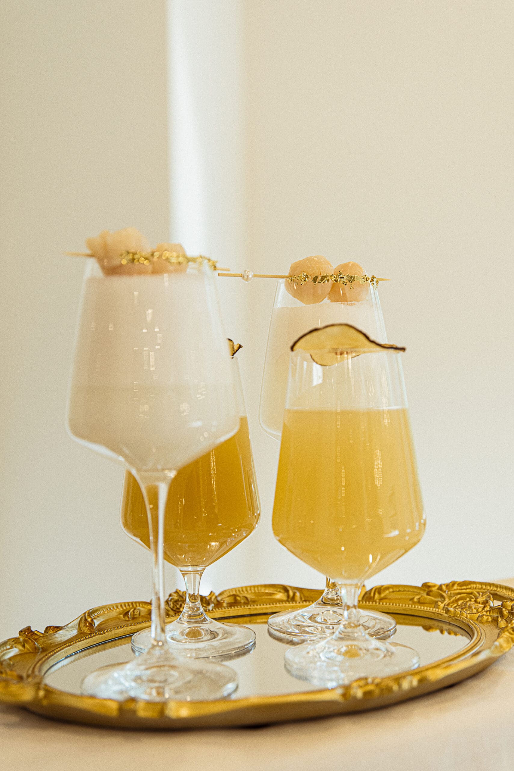 Signature wedding cocktails served on a gold tray at the Old Spanish Quarter styled shoot