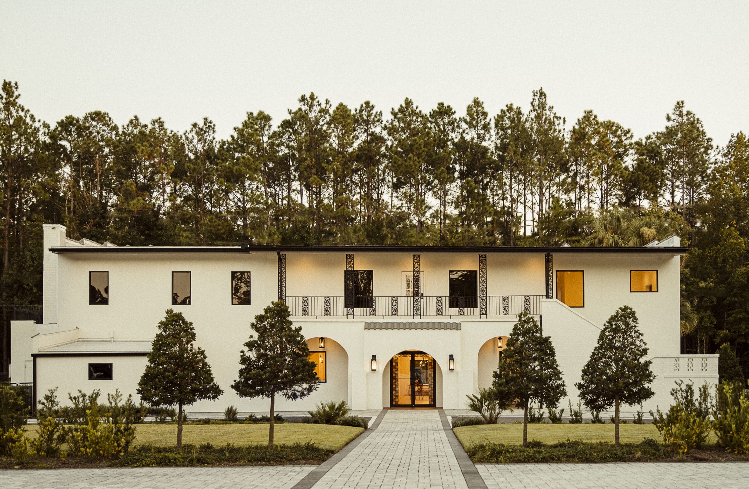 Old Spanish Quarter wedding venue in Jacksonville, Florida- Spanish Revival architecture glowing in golden light.