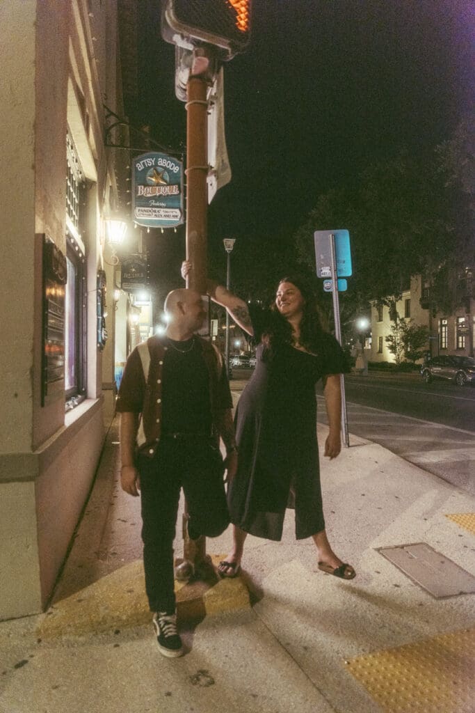 Couple dancing under street lights in downtown St. Augustine Florida romantic wedding photo. 