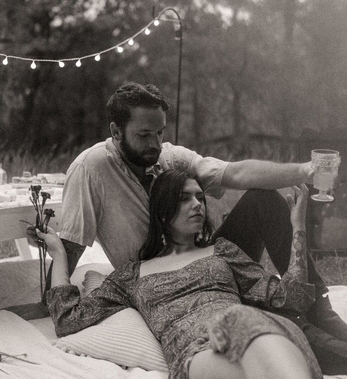 Couple relaxing together during an intimate wedding day in St. Augustine, Florida captured in a candid storytelling moment.