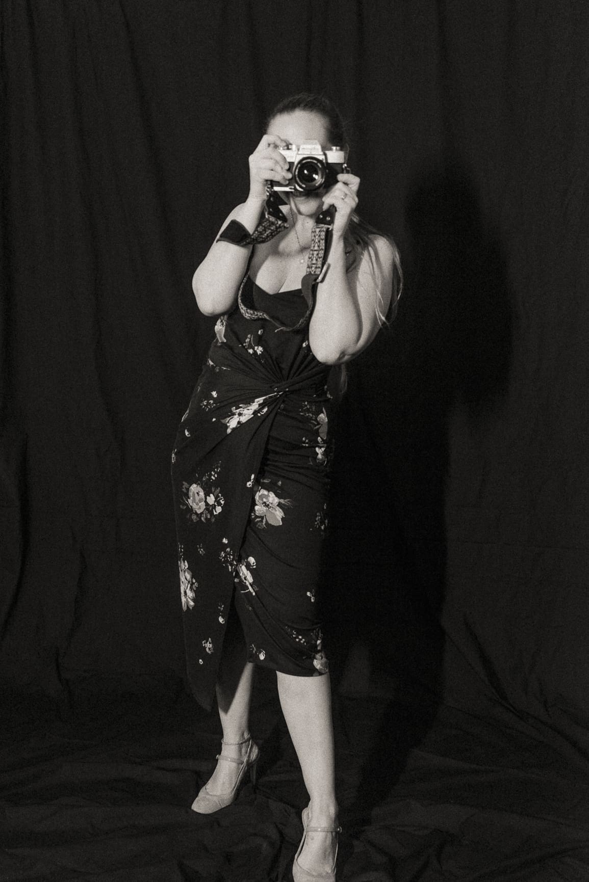 Brandi Denslow photographing with intention, representing a hands-on and guided photography experience