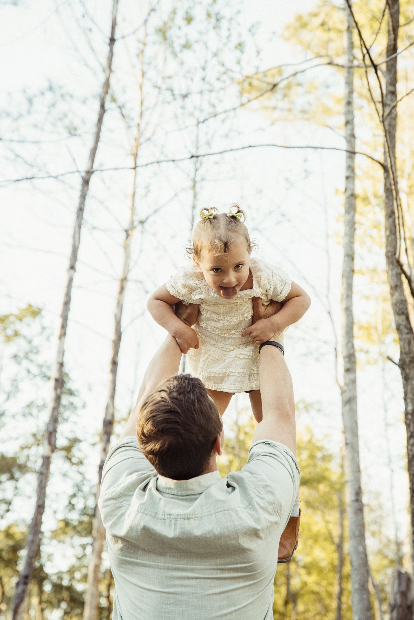 relaxed family session in soft evening light outdoors