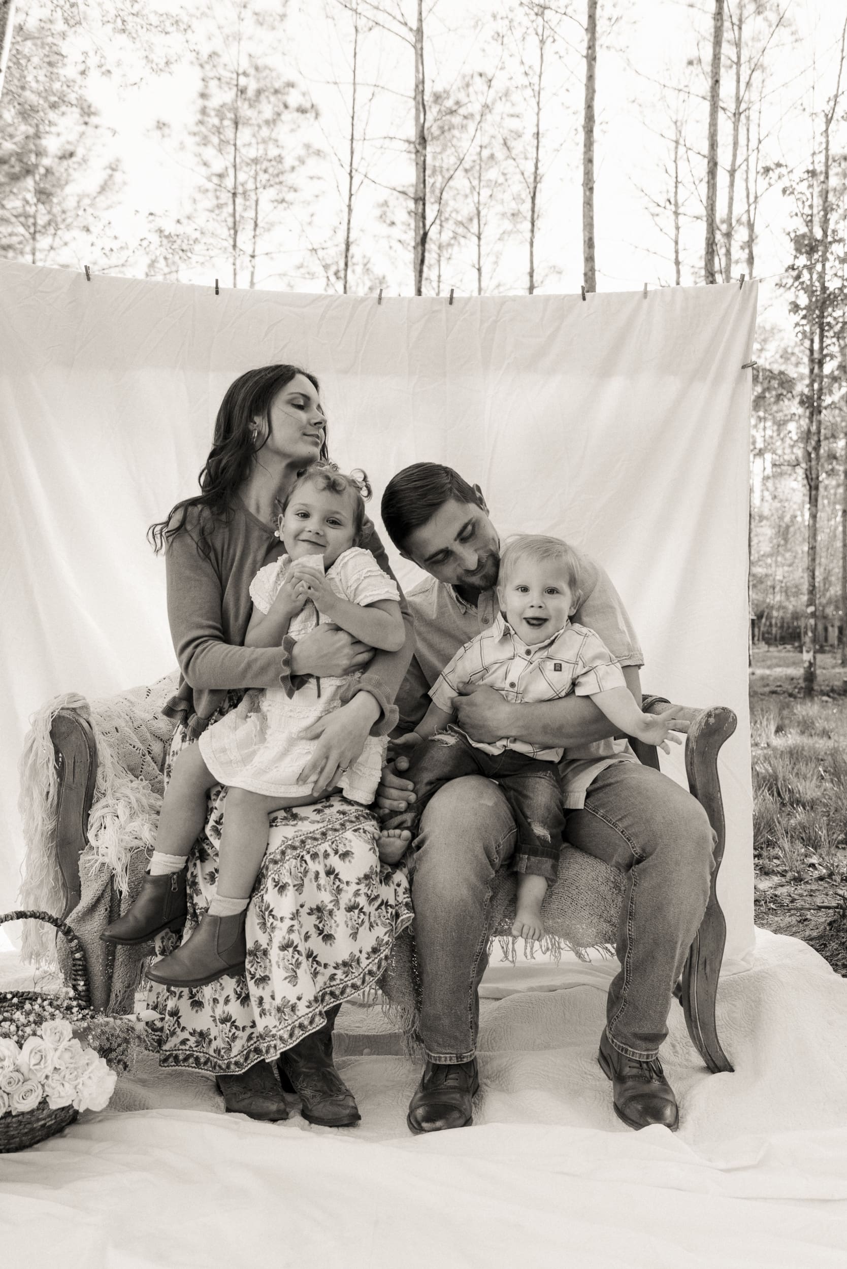 candid family photographer capturing real moments in a backyard setting