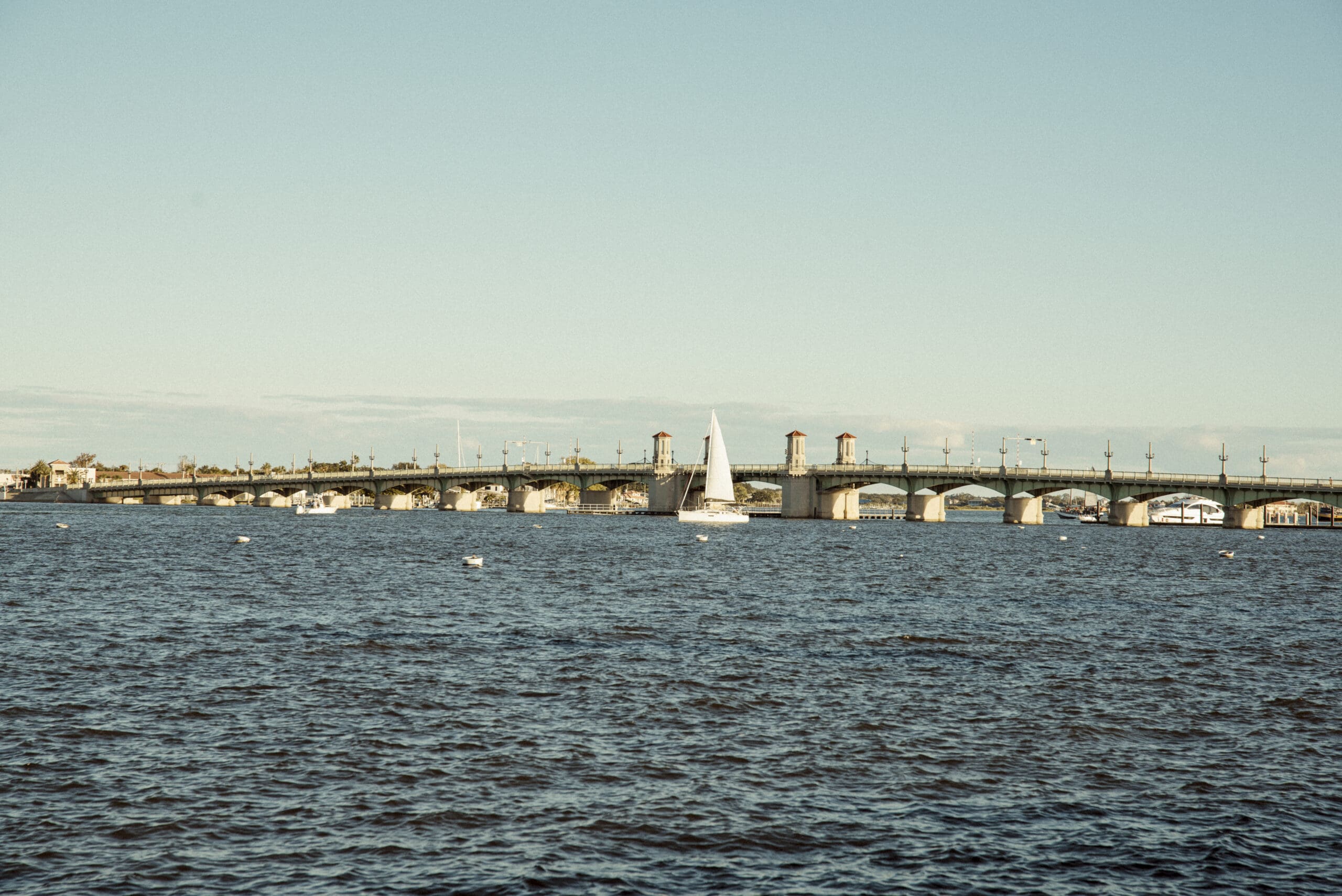 View of the Bridge of Lions and waterfront in downtown St. Augustine for elopement portraits. 