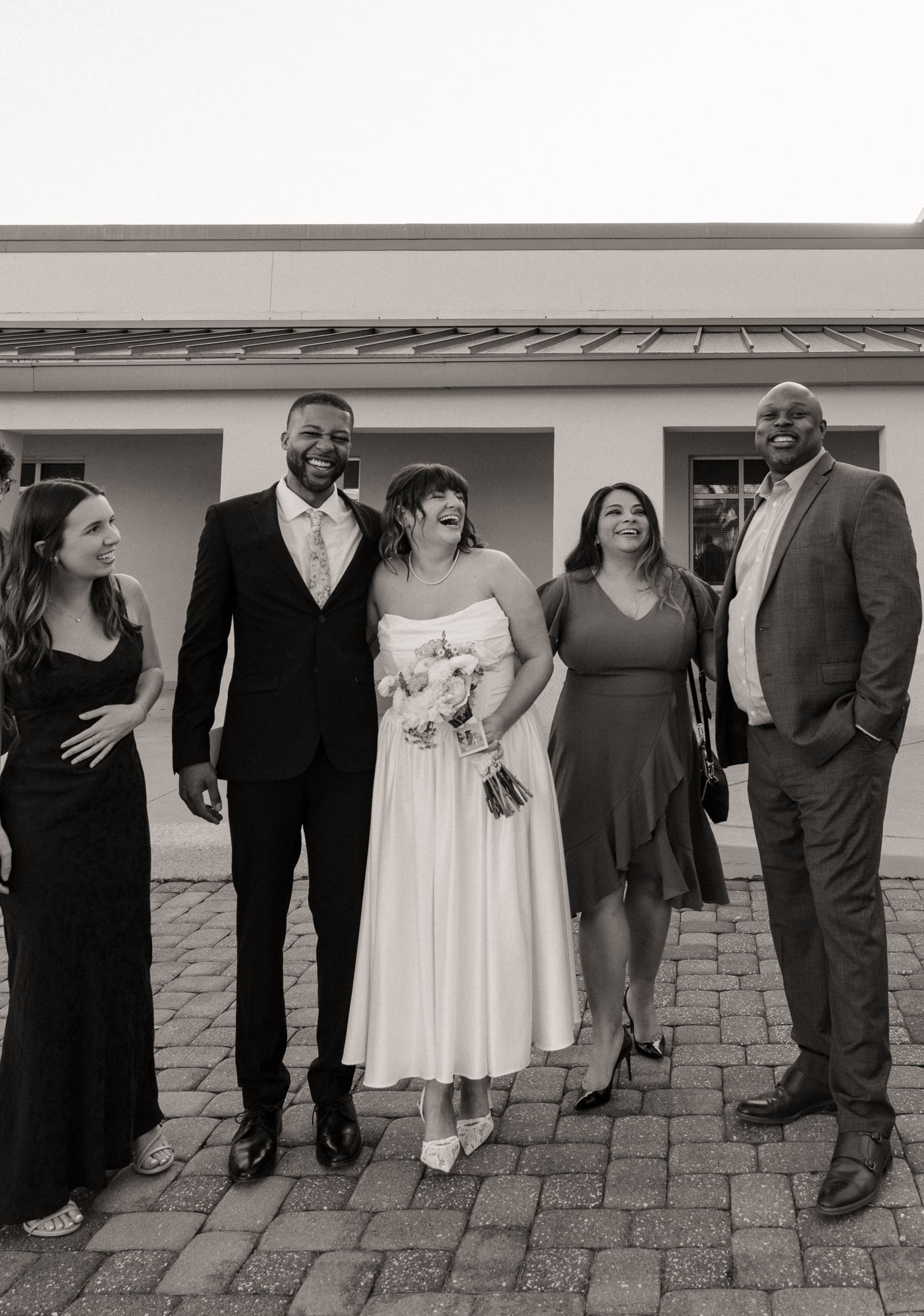Family celebrating together after courthouse elopement in St Augustine. 