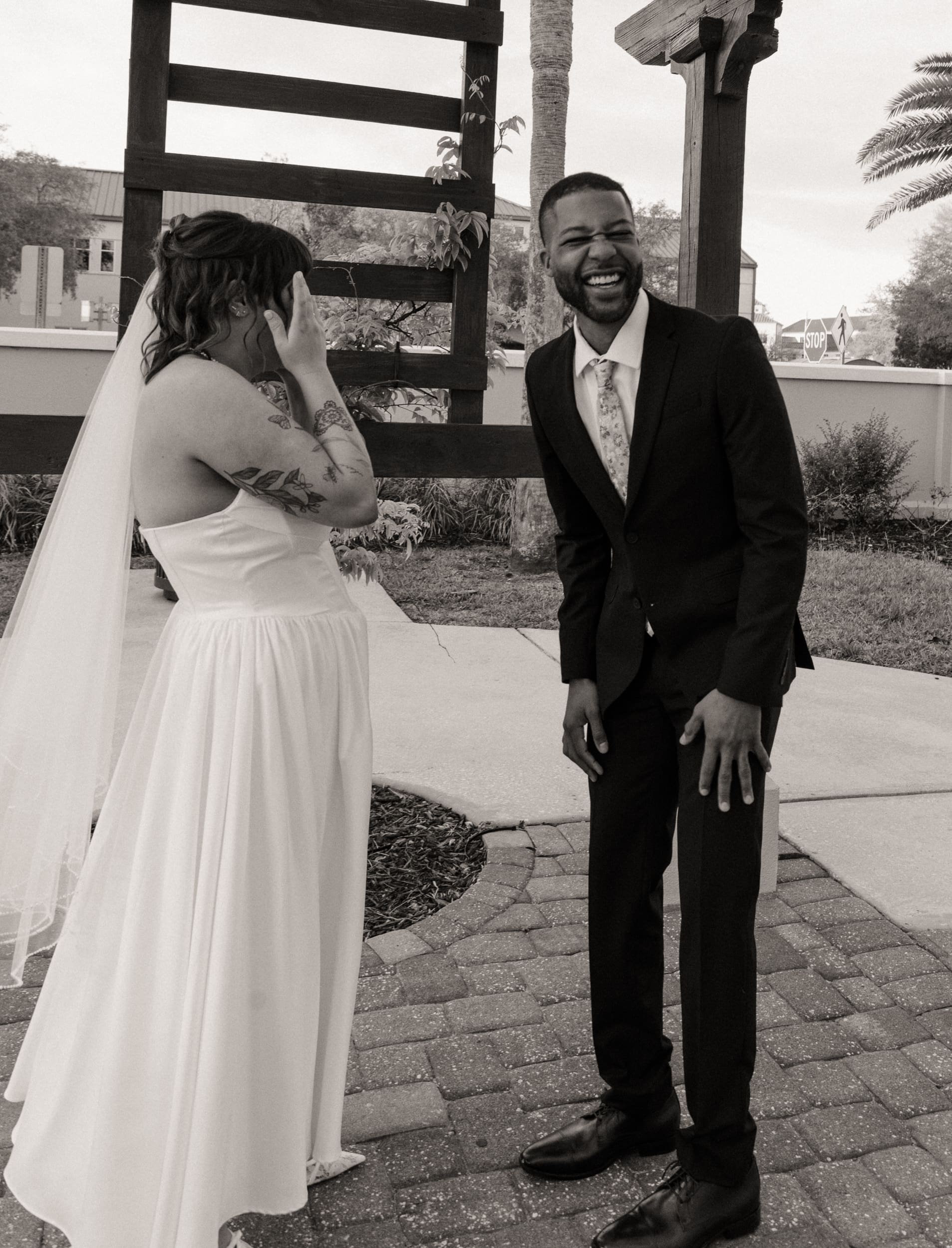 Couple laughing together after vow exchange during courthouse elopement in St Augustine. 