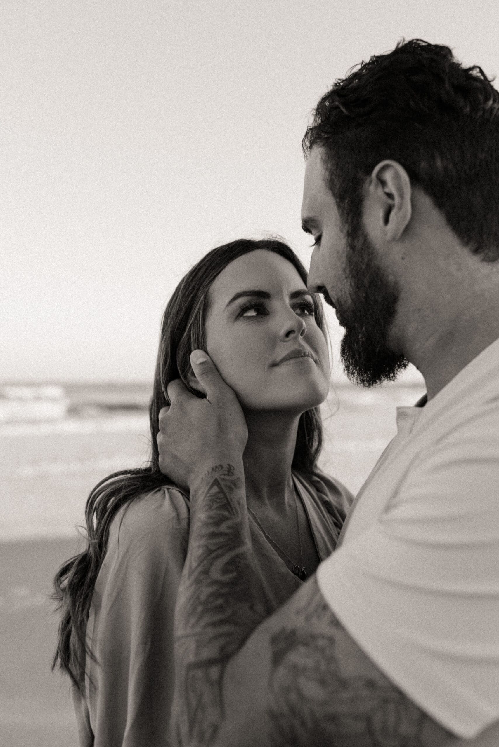 Intimate editorial couple portrait with guided posing and cinematic direction. 