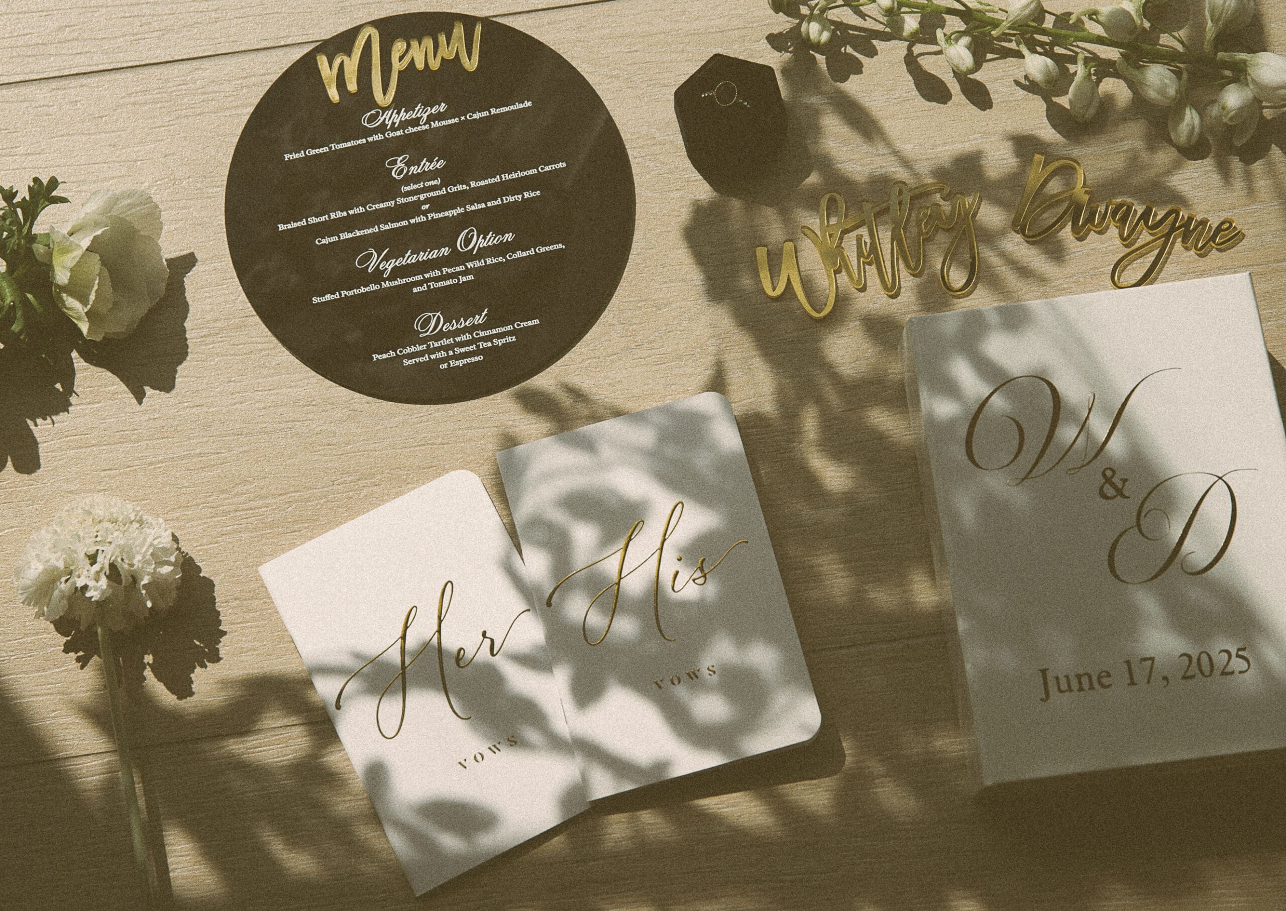 Wedding day detail flat lat including vow books, ring box, and custom menu, St. Augustine wedding photographer