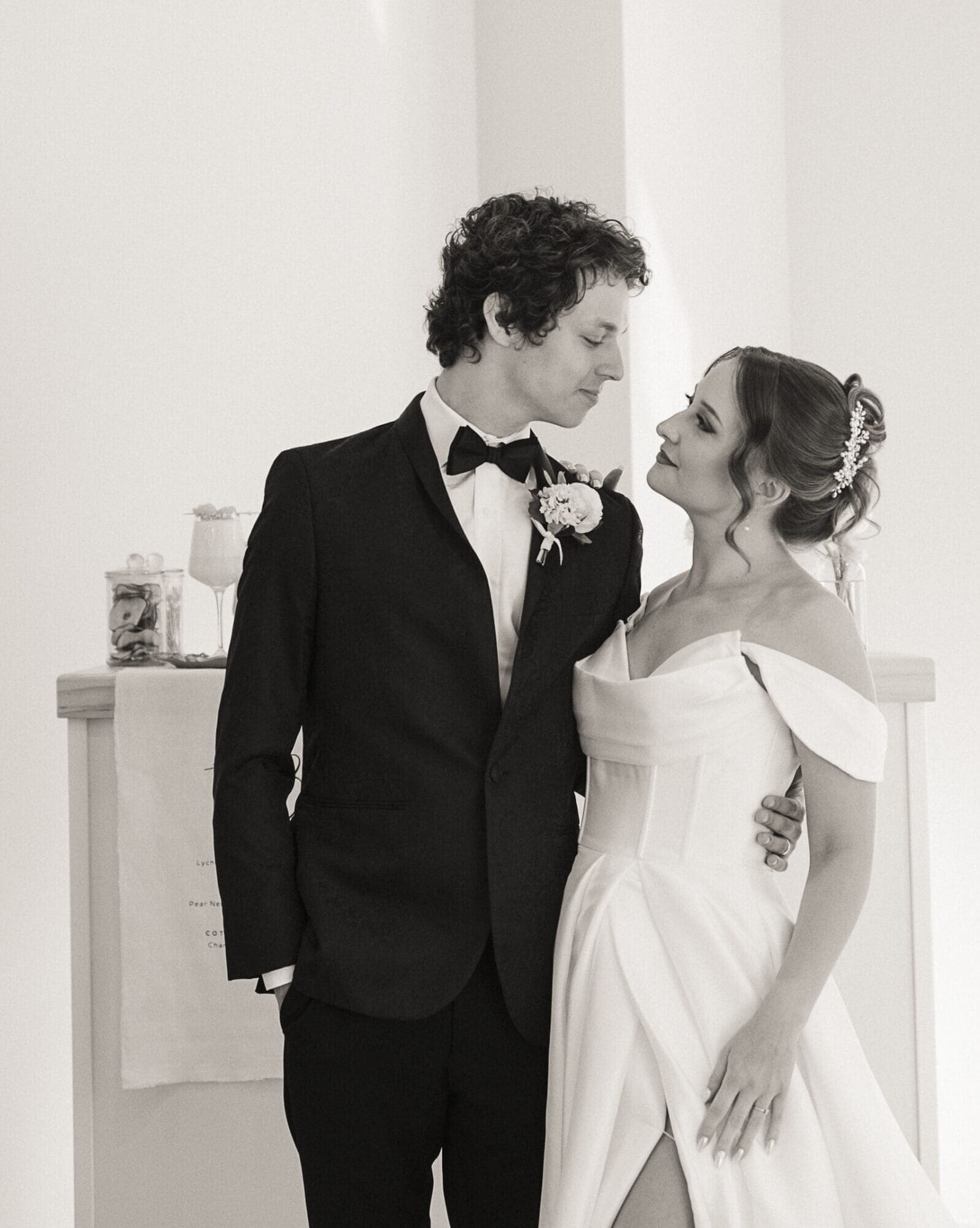 Bride and groom sharing an intimate moment during wedding portraits, St. Augustine wedding photographer Brandi Denslow.