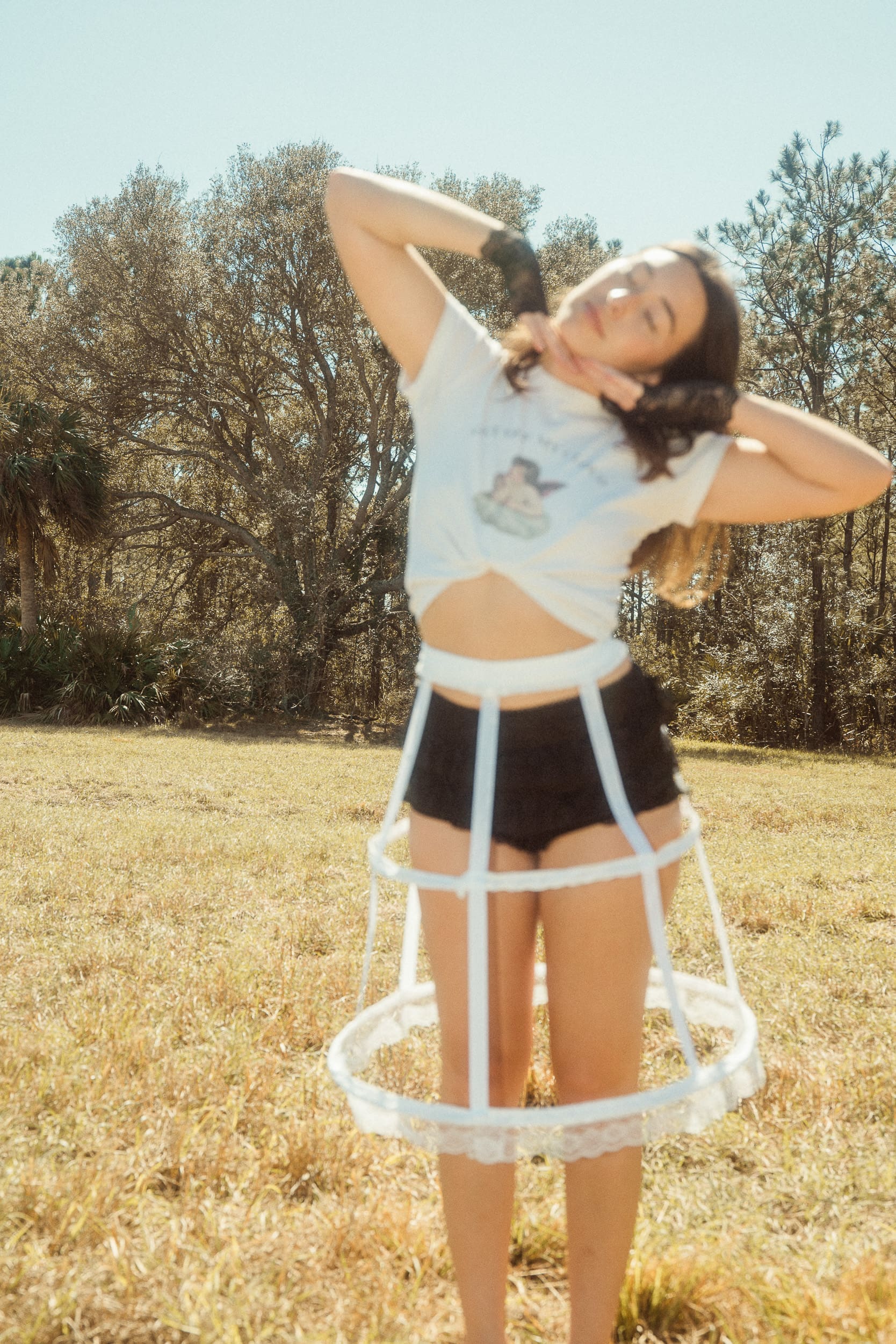 Outdoor editorial portrait celebrating confidence, movement, and authentic expression in St. Augustine.