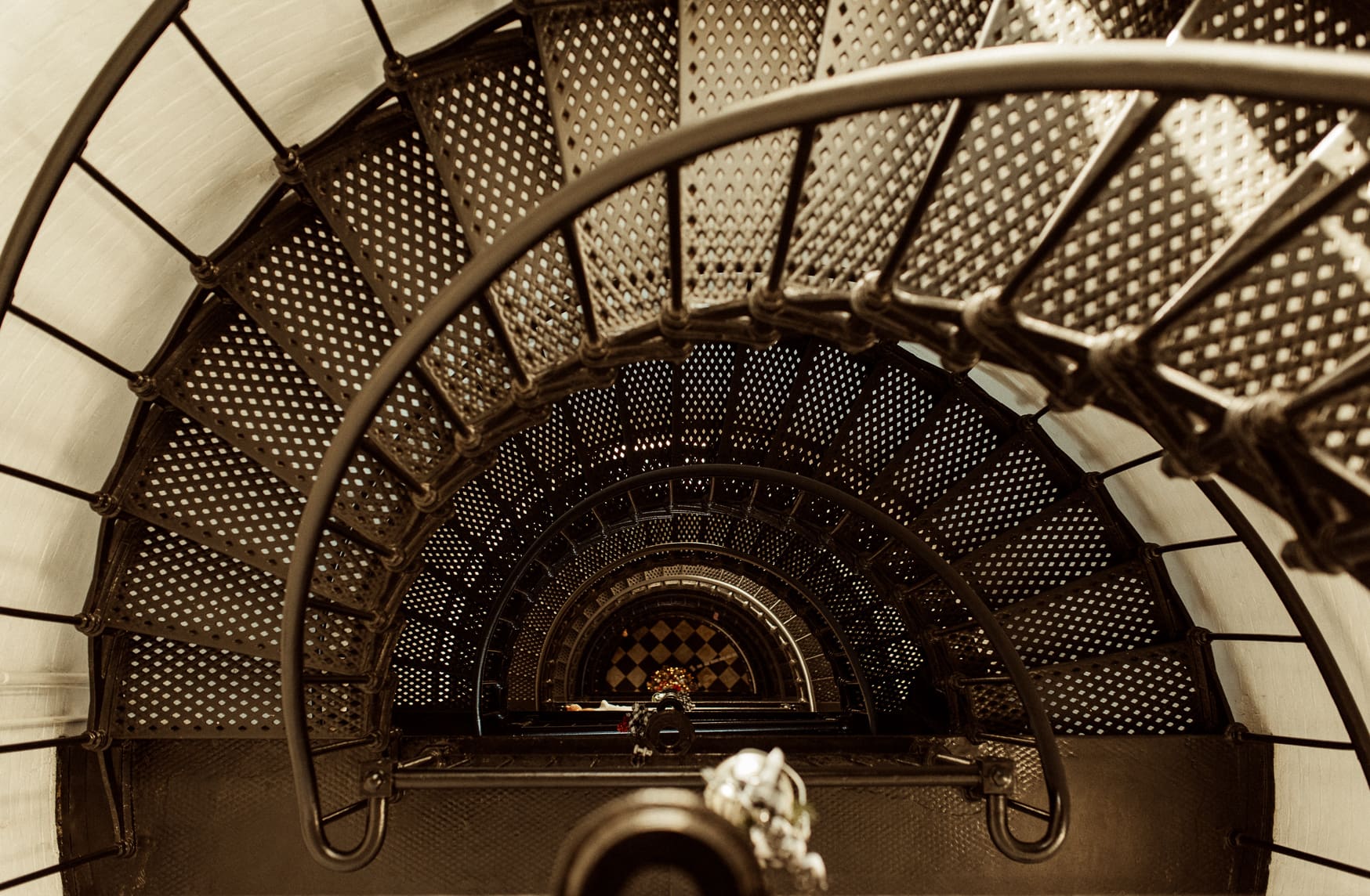 Looking down the iron spiral staircase inside the St. Augustine Lighthouse